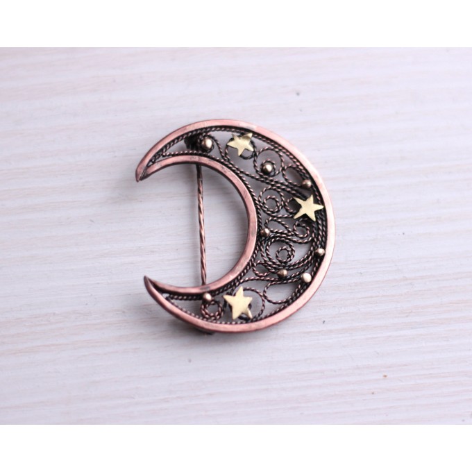 Copper filigree moon broch