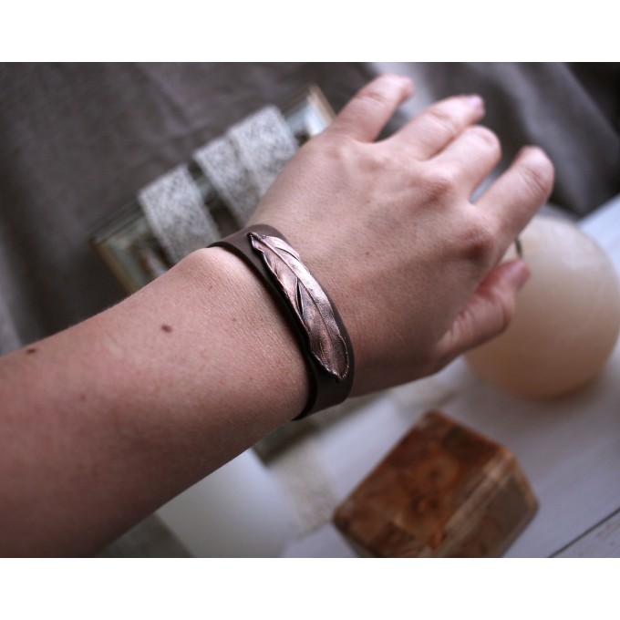 Leather bracelet with copper feather