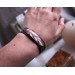 Leather bracelet with copper feather