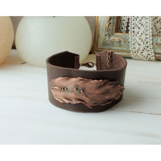 Leather bracelet with copper feather