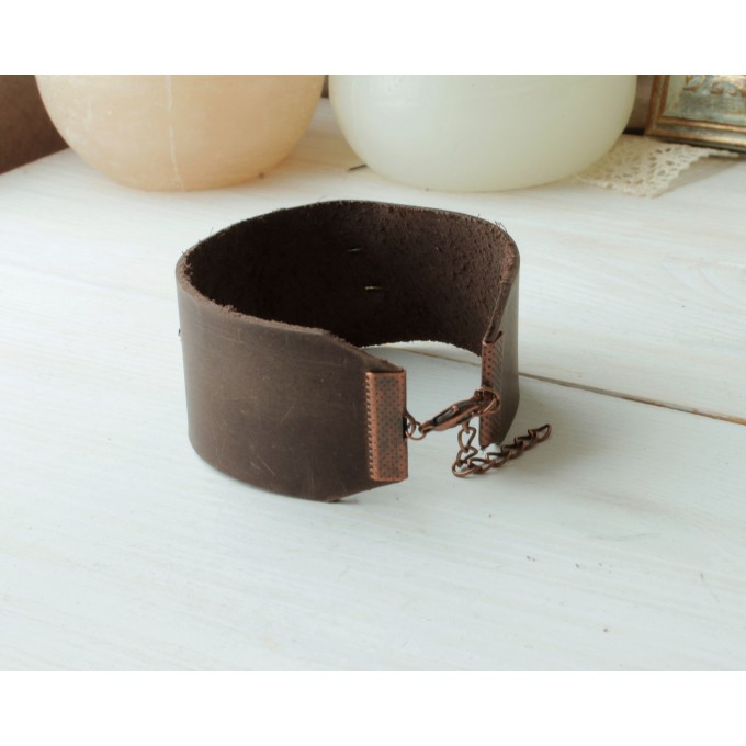 Leather bracelet with copper feather